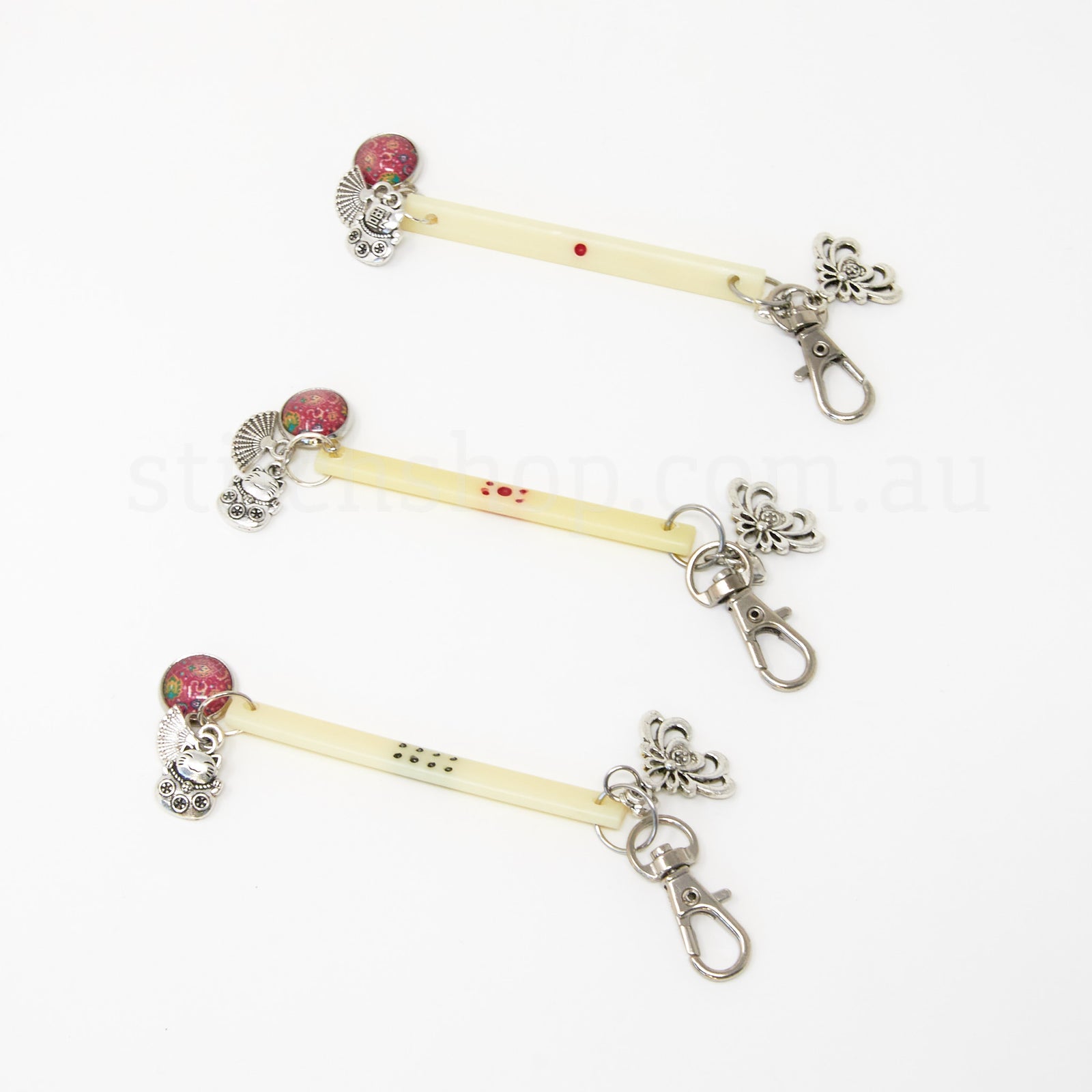 Bird in the Hand Scissor Fob